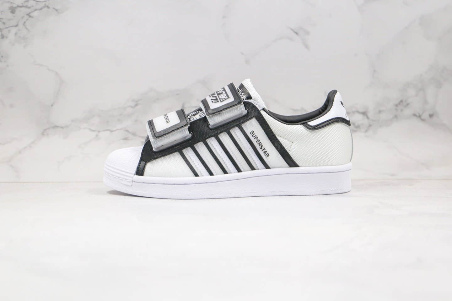 阿迪达斯adidas Superstar x Ji Won Choi x Olivia Oblanc纯原版本三方联名款贝壳头魔术贴绑带黑框透明网面板鞋原楦头纸板打造 货号:FW6635