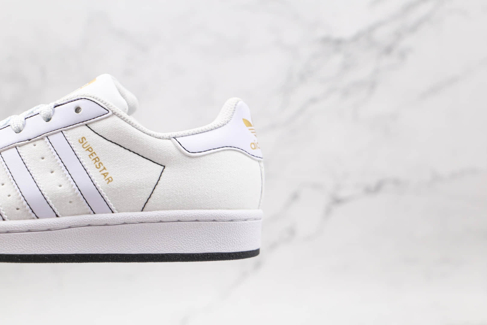 阿迪达斯adidas Originals Superstars纯原版本三叶草贝壳头帆布板鞋白黑缝线区别市面通货 货号:AJ7924