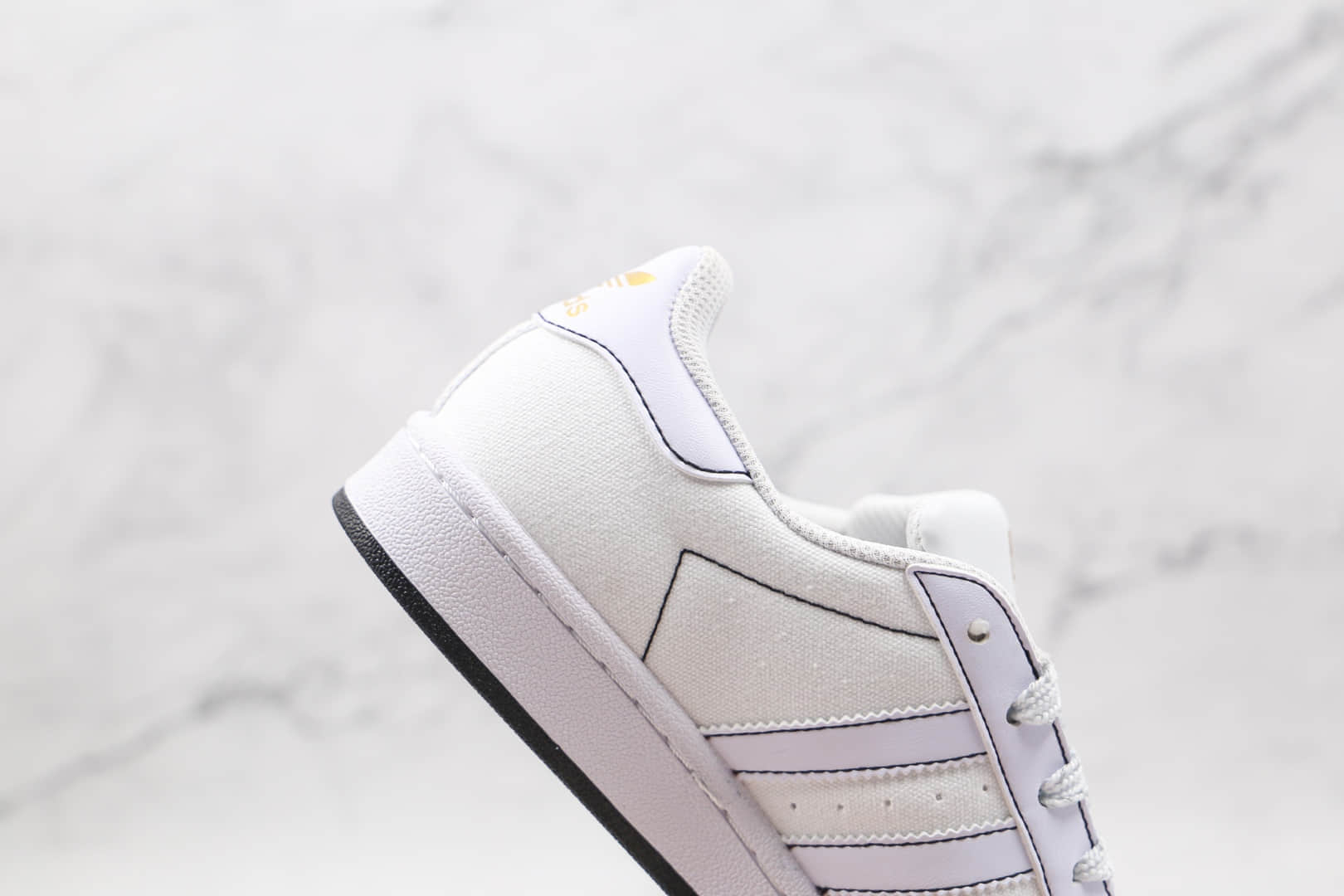 阿迪达斯adidas Originals Superstars纯原版本三叶草贝壳头帆布板鞋白黑缝线区别市面通货 货号:AJ7924