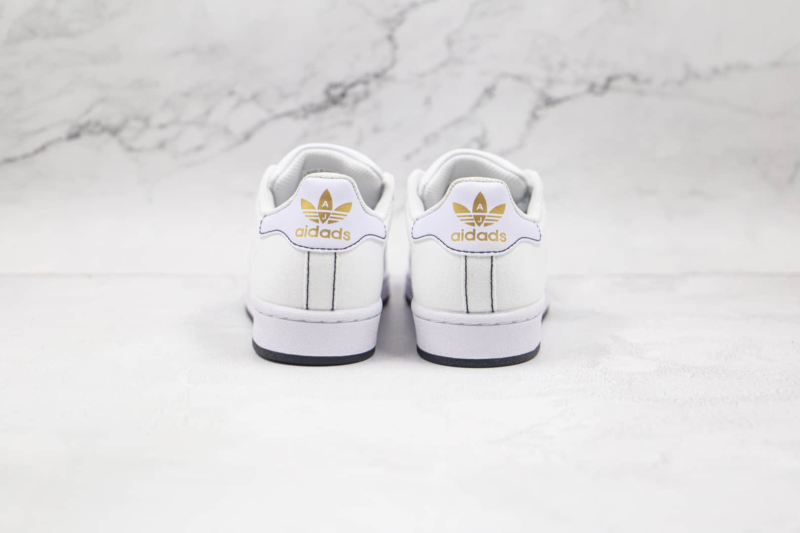 阿迪达斯adidas Originals Superstars纯原版本三叶草贝壳头帆布板鞋白黑缝线区别市面通货 货号:AJ7924